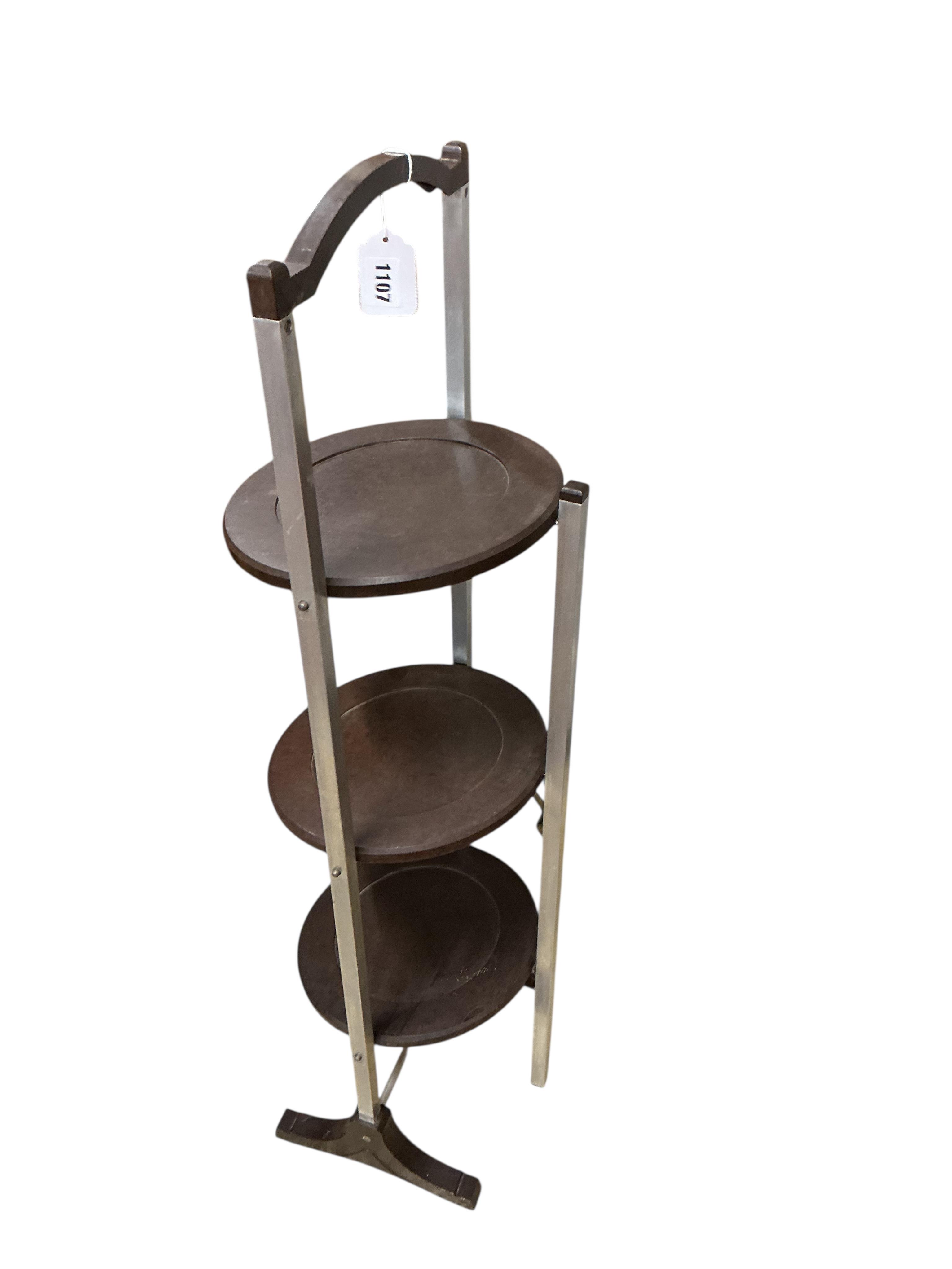 A Bakelite cake stand, width 29cm, depth 27cm, height 94cm